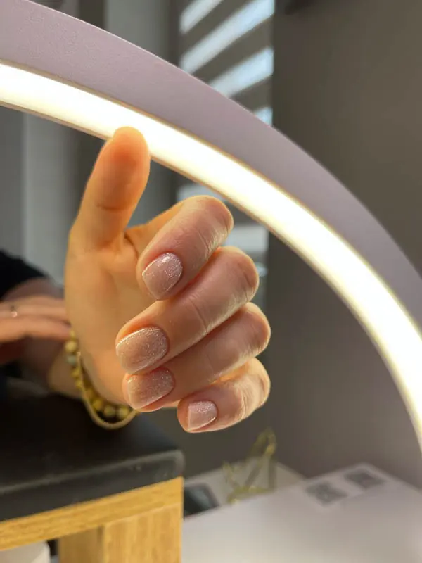Delicate shimmering soft gel manicure by Elena