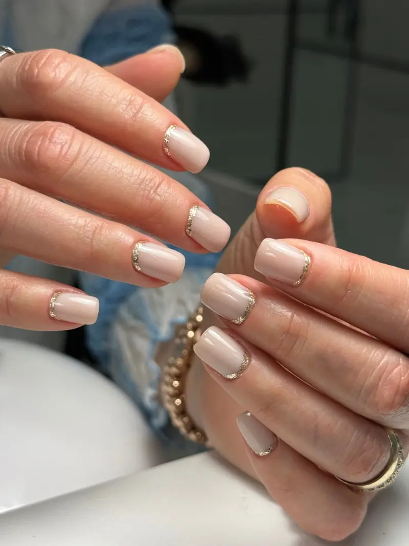 Sample French manicure shown as a placeholder for Olha's portfolio