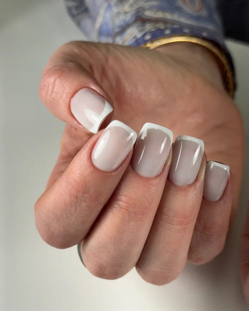 Sample minimal manicure shown as a placeholder for Olha's portfolio