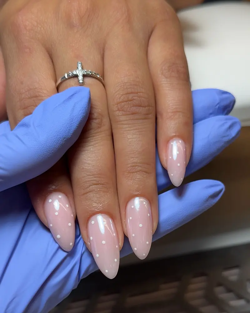 Pink hard gel manicure with white dot design by Olya