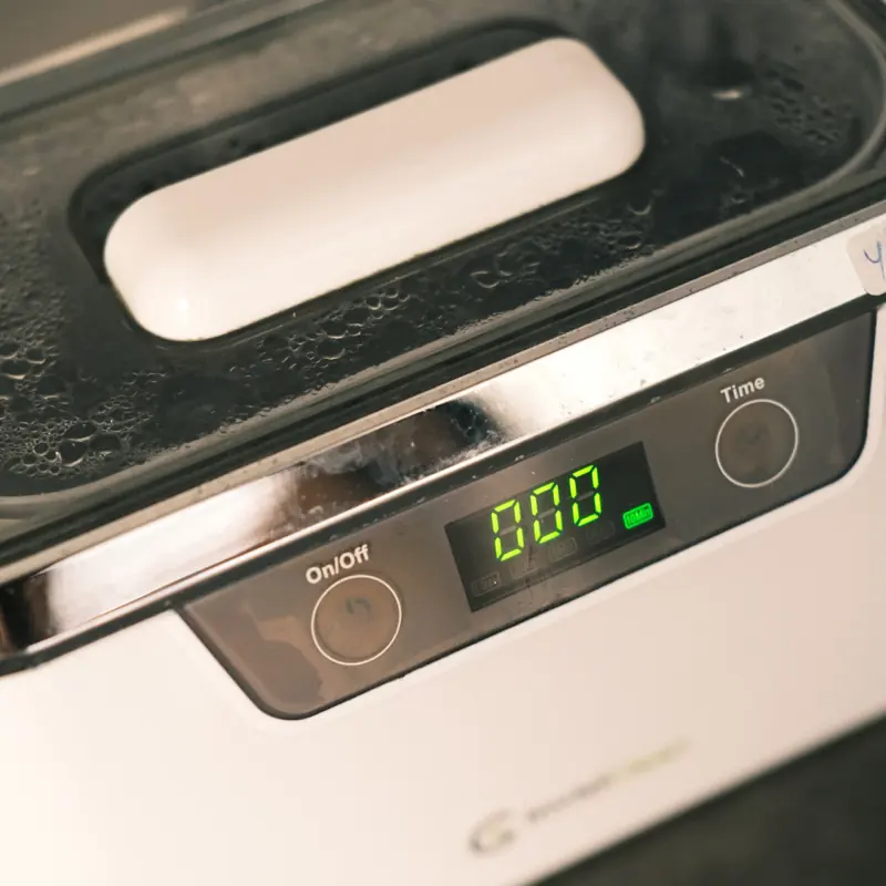 Ultrasonic cleaner used for manicure tool sanitation at Darlings Beauty Lab